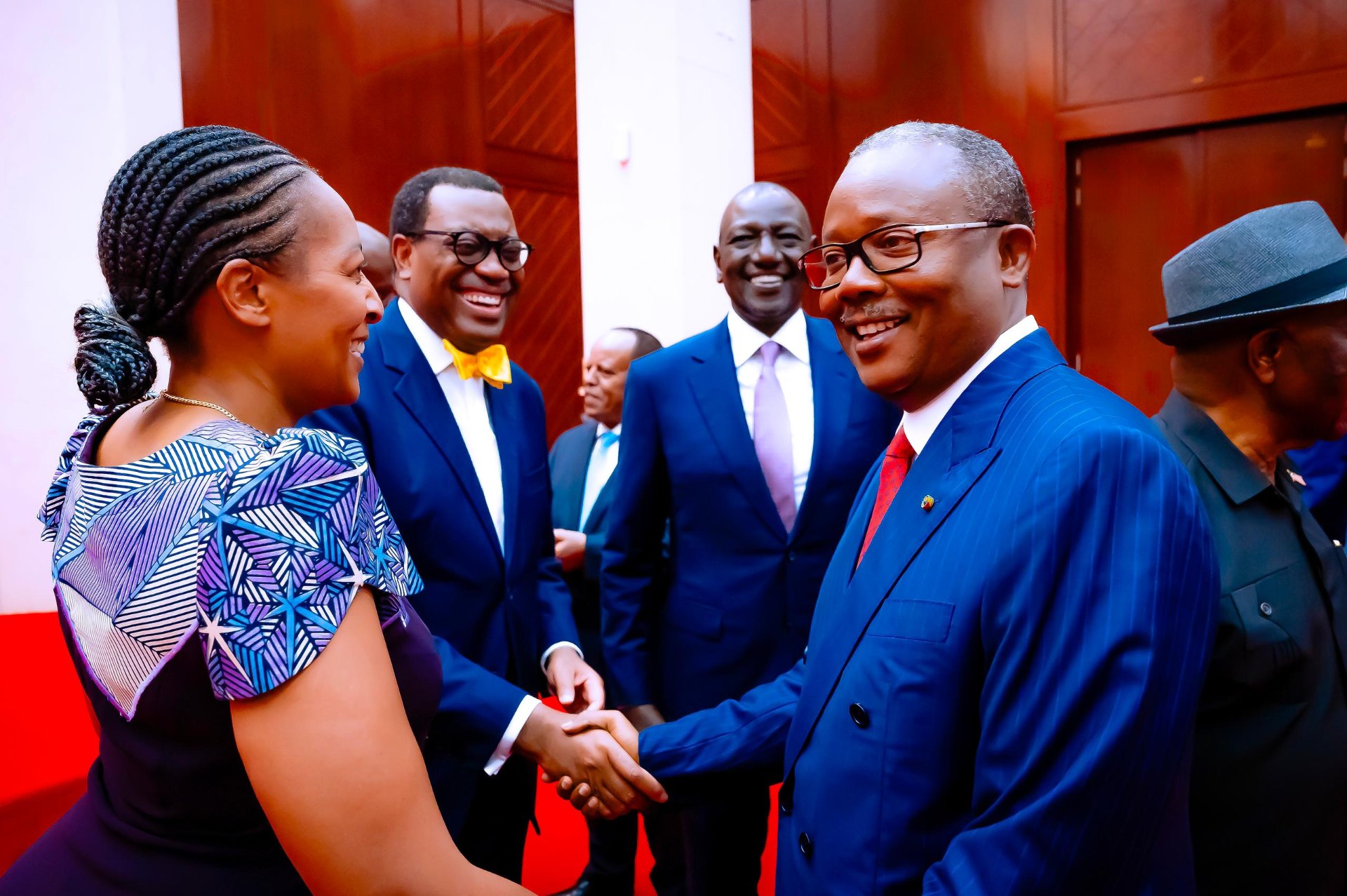 Phanice of Africa greeting Head of State at diplomatic reception